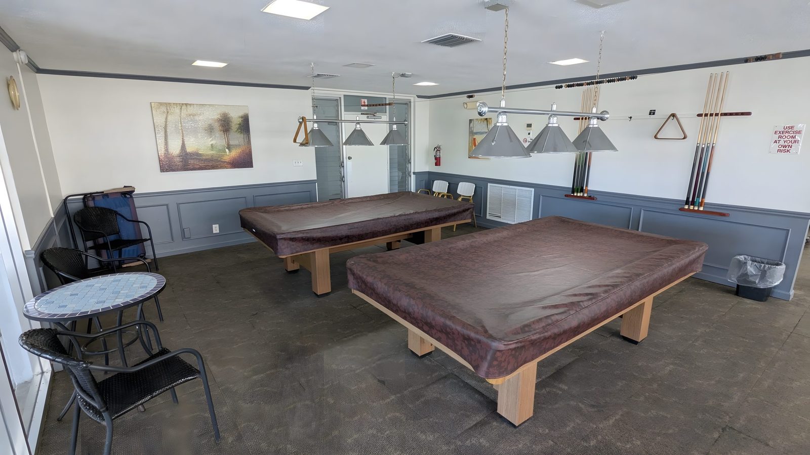 The billiard room with two tables.