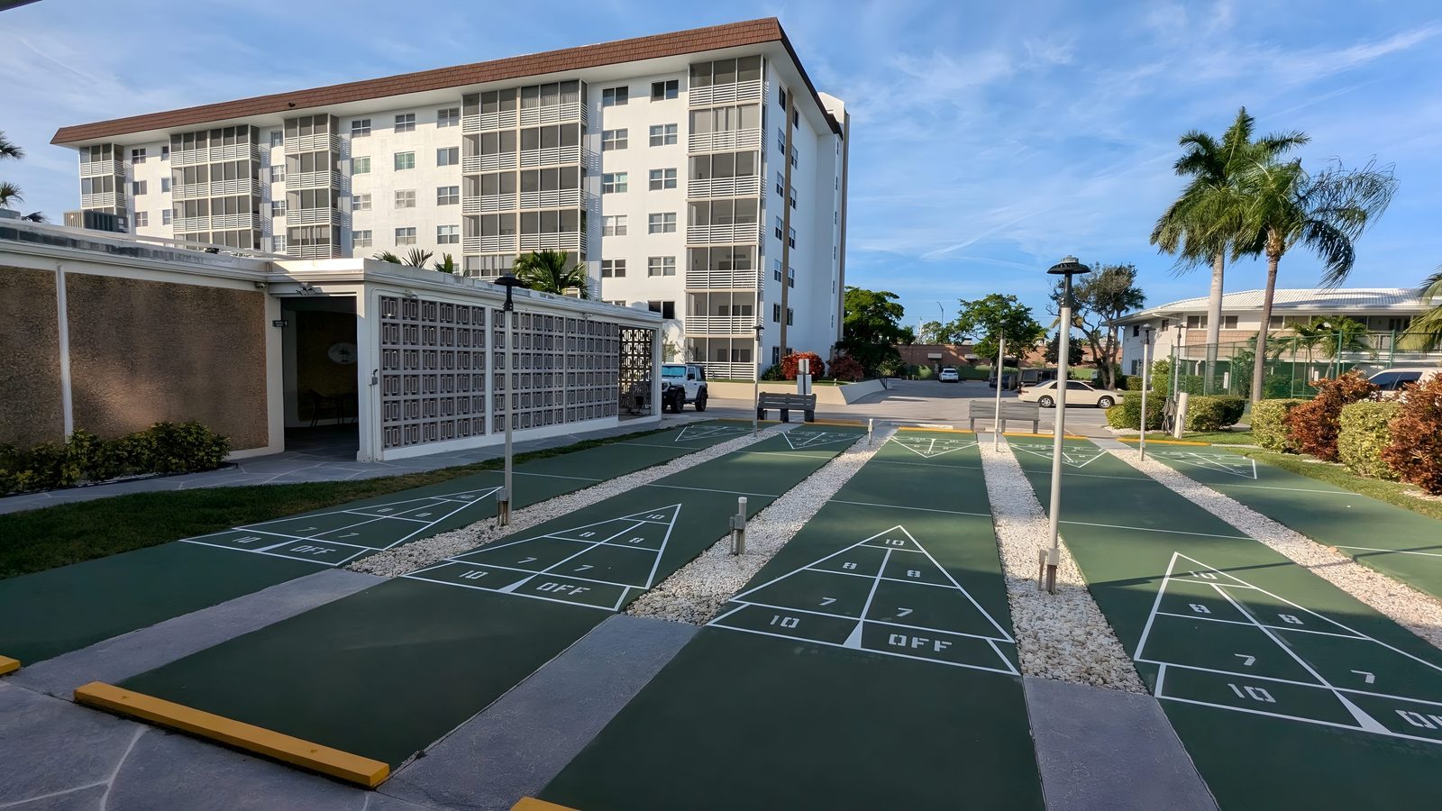 Shuffleboard courts beside the building.